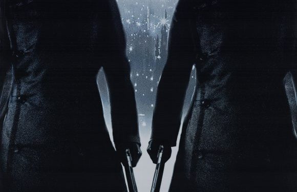 Equilibrium movie poster, depicting Christian Bale and Taye Diggs dressed all in black, looking stern and holding handguns.