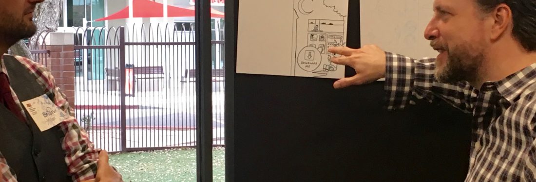 Mark Siegel and Brian Miller discuss a storyboard