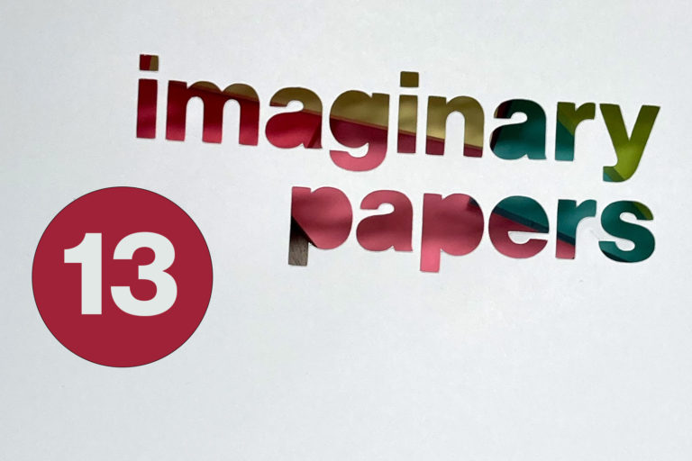 Text of "imaginary papers" cut away from white cardstock, brightly colored paper behind it. The number 13 is in a red circle on the left side.